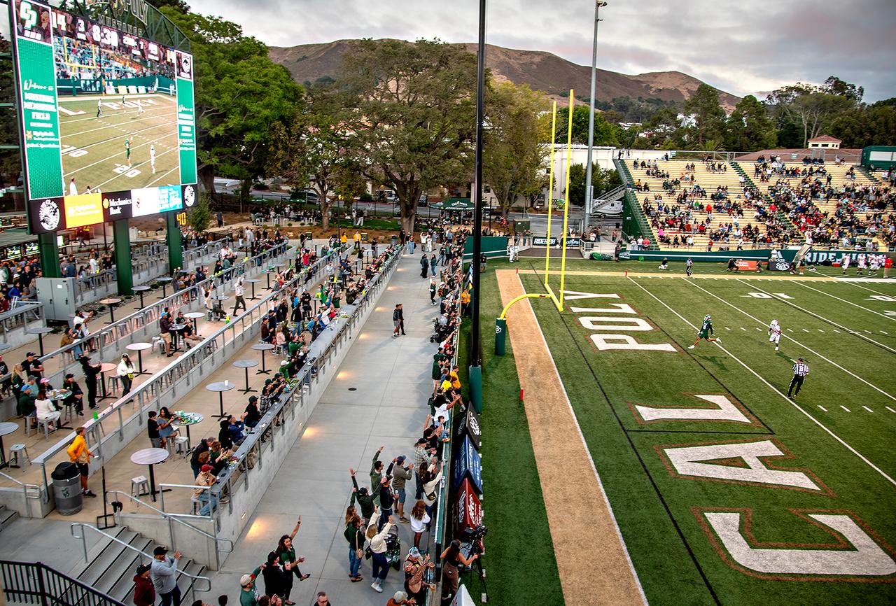 Image of Cal Poly's Stadium with people.